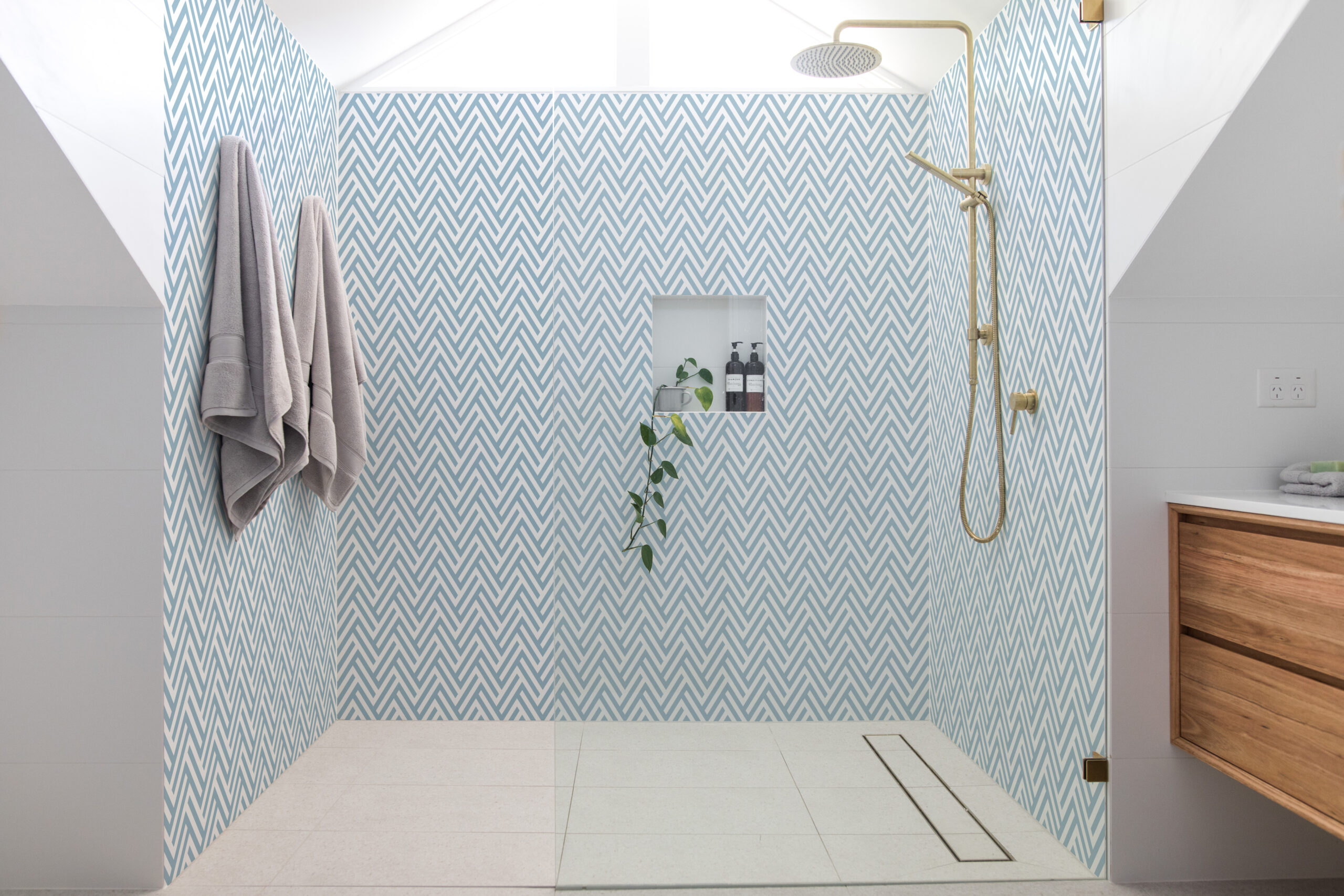 Blue chevron glass in shower